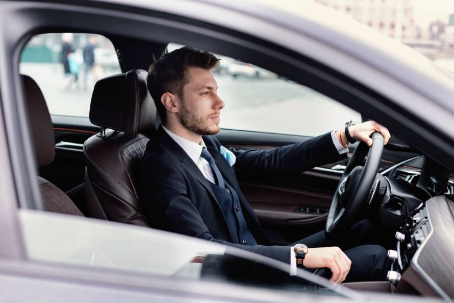 A man driving a car