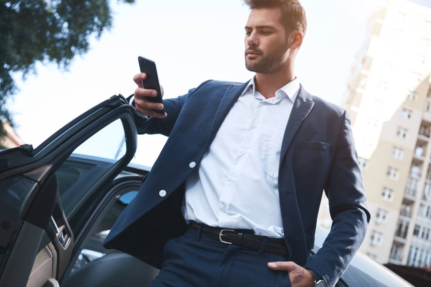 a photo of man holding a phone